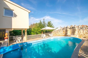 Apartment Uvo 2 with communal swimming pool